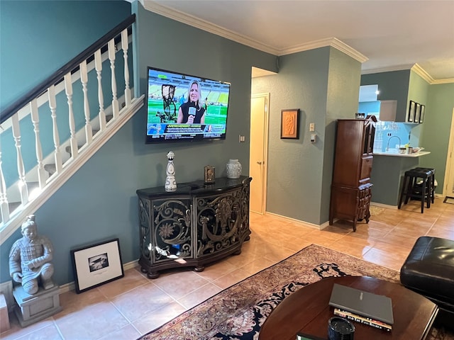 living room featuring crown molding and light tile patterned floors