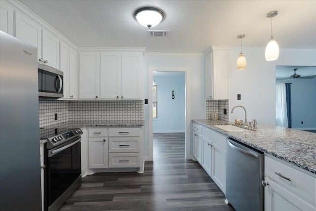 kitchen featuring white cabinetry, sink, and stainless steel appliances