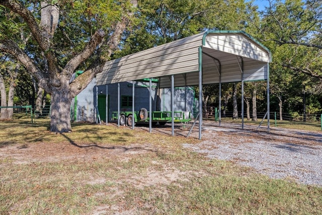 view of outbuilding featuring a carport