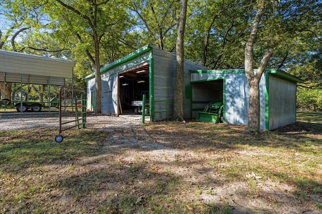 view of outbuilding featuring a carport