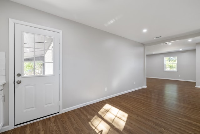 interior space with dark hardwood / wood-style flooring