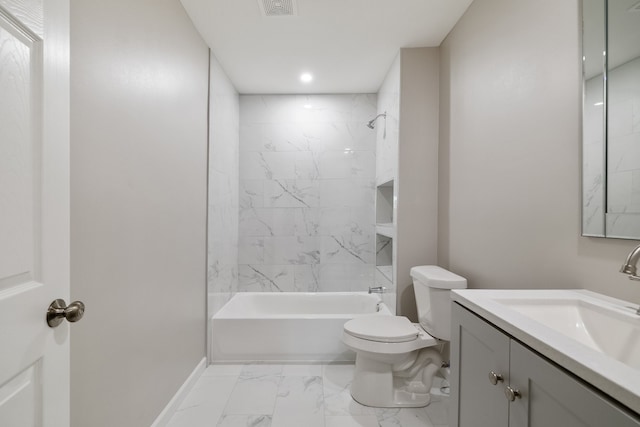 full bathroom with vanity, toilet, and tiled shower / bath combo