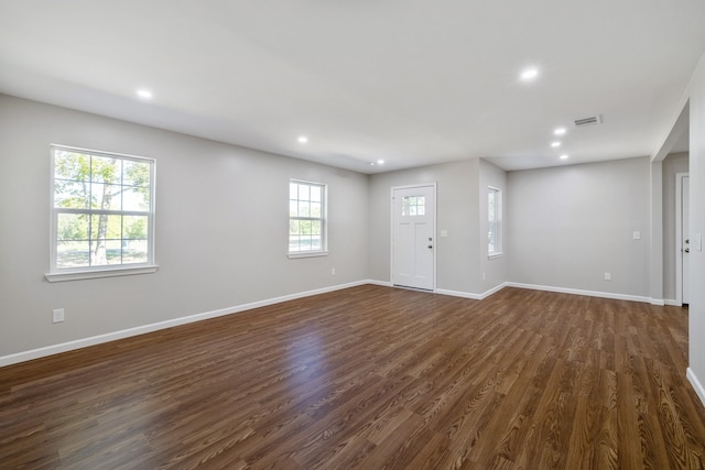 interior space with dark hardwood / wood-style floors