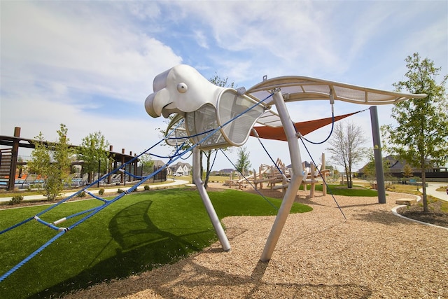 view of jungle gym with a lawn