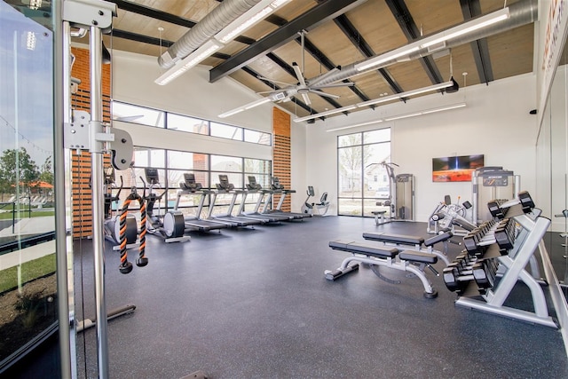 gym with high vaulted ceiling