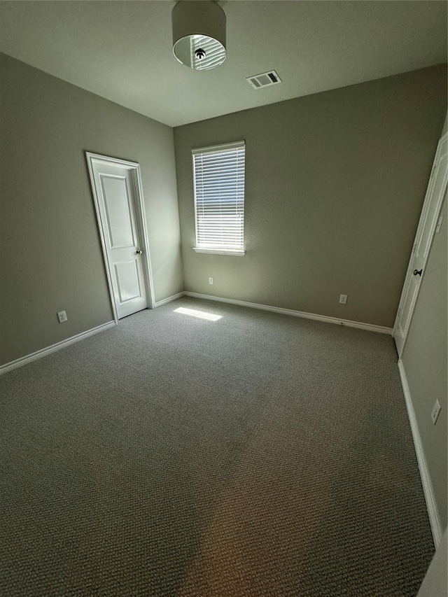 unfurnished bedroom featuring carpet flooring