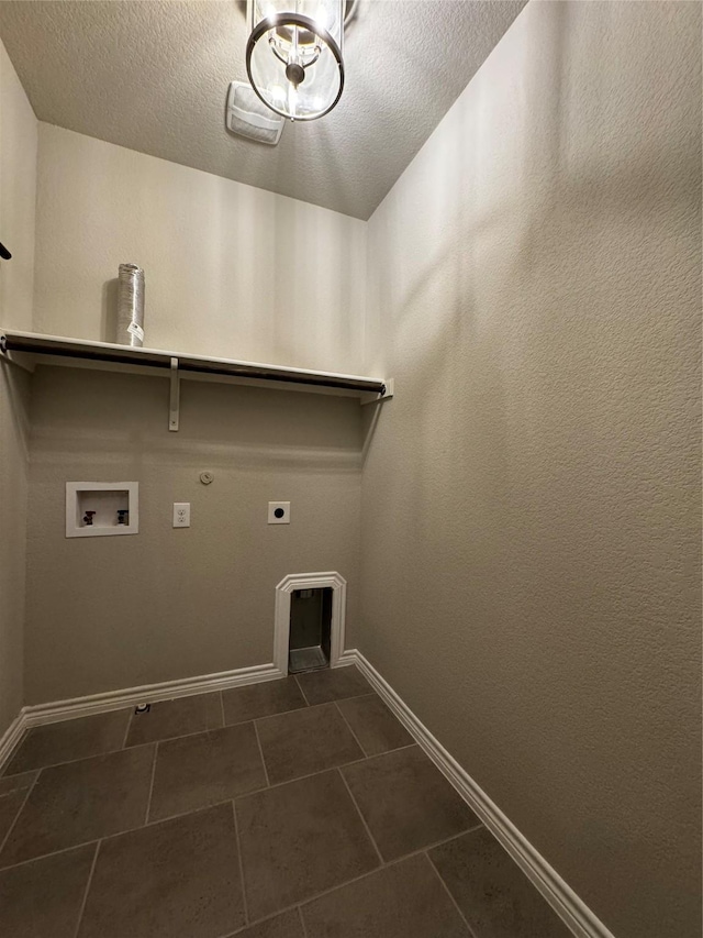 514 Sheer Bliss Ln, Fort Worth, TX 76114 - washroom featuring electric dryer hookup, washer hookup, a textured ceiling, hookup for a gas dryer, and dark tile patterned floors
