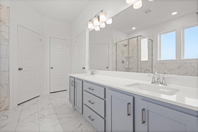 bathroom with vanity and an enclosed shower