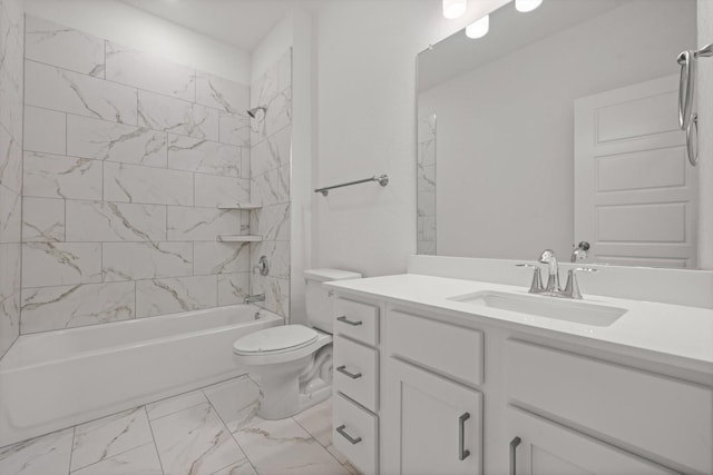 full bathroom with vanity, tiled shower / bath combo, and toilet