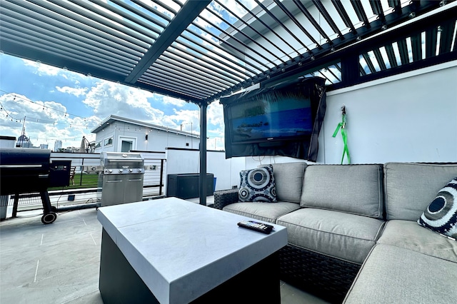 view of patio / terrace featuring a pergola, an outdoor living space, area for grilling, and exterior kitchen