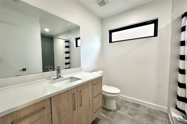 bathroom featuring vanity, tile patterned floors, toilet, and a shower with shower curtain