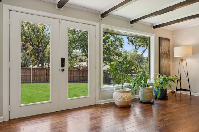 entryway featuring beamed ceiling, french doors, plenty of natural light, and hardwood / wood-style floors