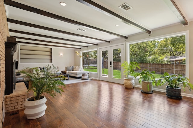 sunroom / solarium with french doors and beam ceiling