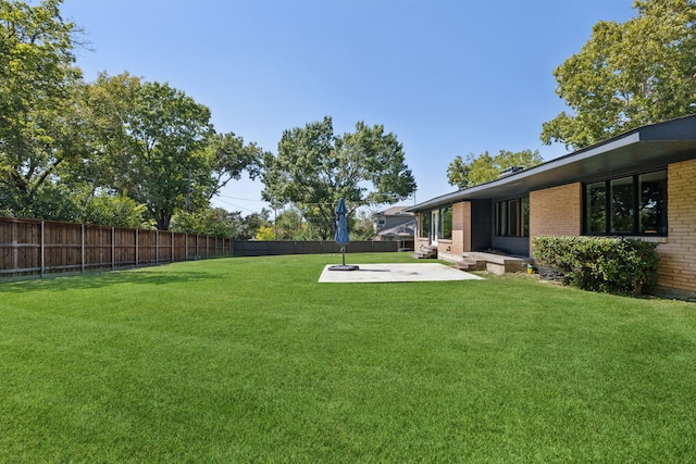 view of yard with a patio