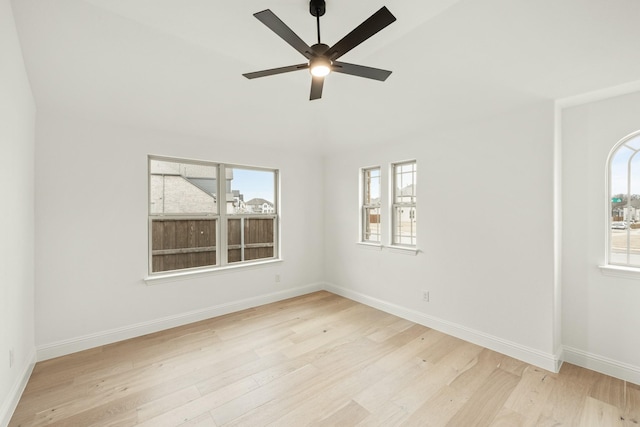 spare room with ceiling fan and light hardwood / wood-style floors