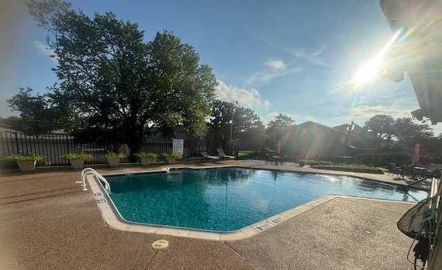 311 Oak Shadow Cir, Bedford, TX 76021 - community pool featuring a patio and a fenced backyard