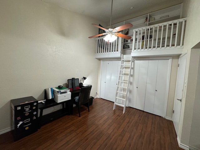 office featuring ceiling fan and dark hardwood / wood-style floors