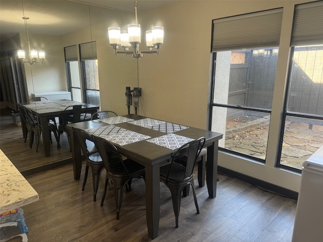 311 Oak Shadow Cir, Bedford, TX 76021 - dining area featuring a chandelier and wood finished floors