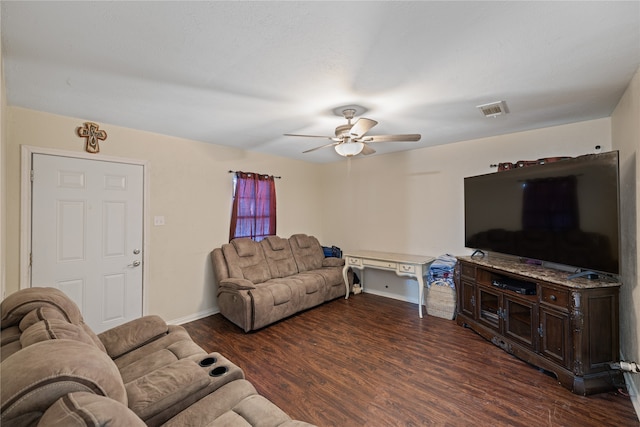 living room with ceiling fan and dark hardwood / wood-style floors