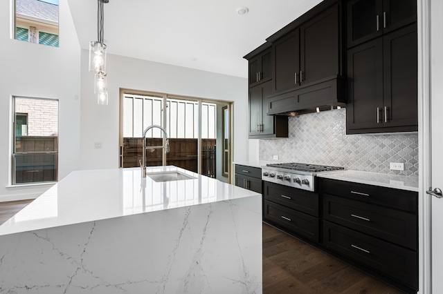 13638 Colony Mews, Frisco, TX 75033 - kitchen with backsplash, a sink, dark wood-style floors, and stainless steel gas stovetop