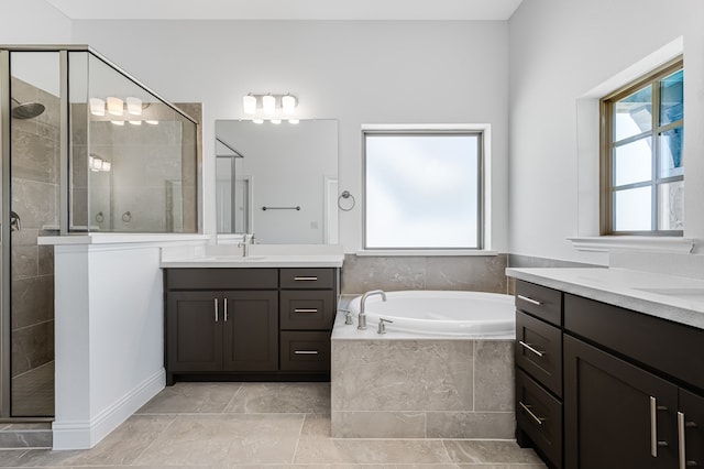 13638 Colony Mews, Frisco, TX 75033 - full bathroom featuring a shower stall, a bath, two vanities, and a sink