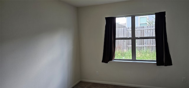 view of carpeted spare room