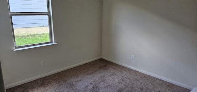 empty room featuring carpet flooring