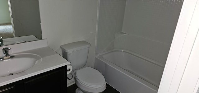 full bathroom with bathtub / shower combination, vanity, and toilet