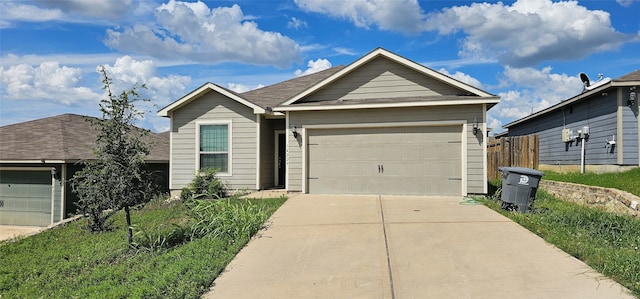 ranch-style home featuring a garage