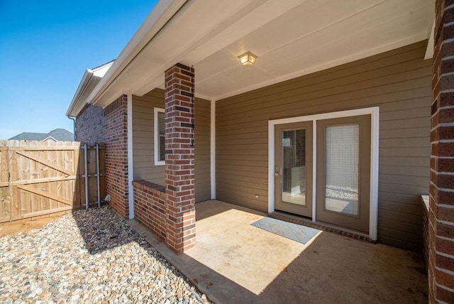 doorway to property featuring a patio