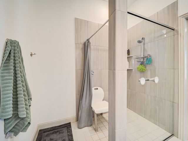 bathroom featuring a shower with curtain and tile patterned flooring