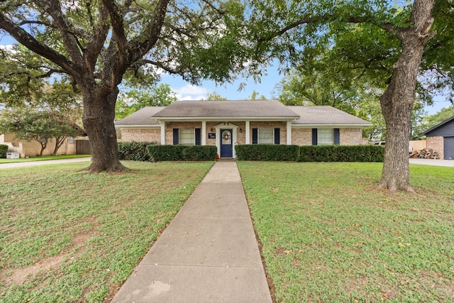 ranch-style house with a front lawn