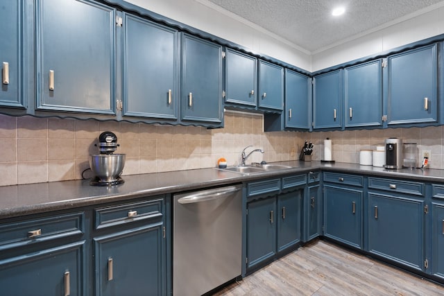 kitchen featuring blue cabinetry, a textured ceiling, and stainless steel dishwasher