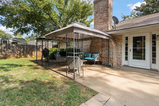 exterior space featuring a gazebo and a patio area