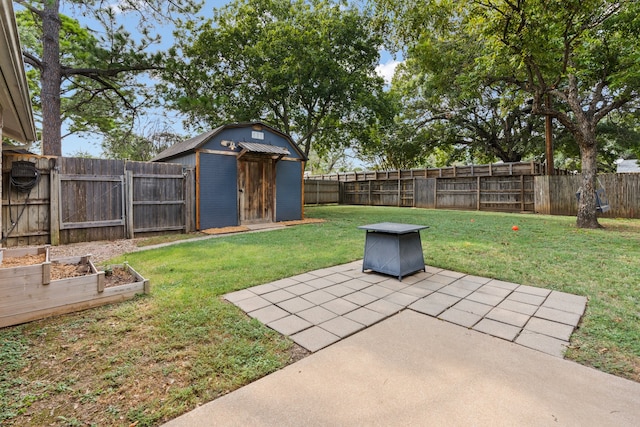 view of yard with a patio area and a shed