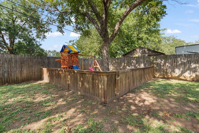 view of yard with a playground