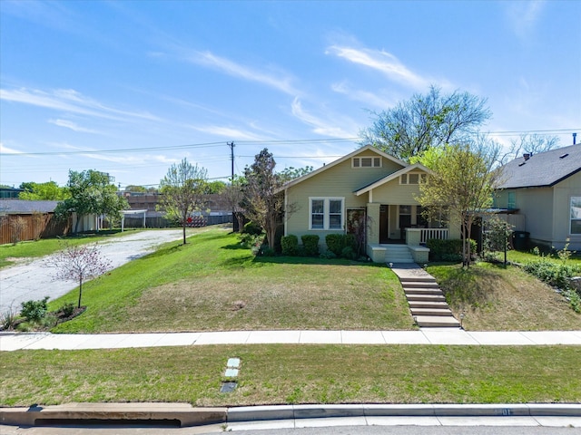 view of front of house featuring a porch and a front yard