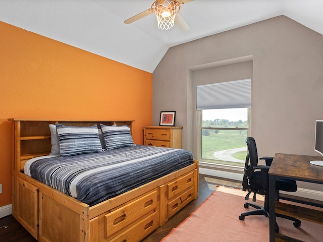 bedroom featuring dark wood-type flooring, ceiling fan, and vaulted ceiling