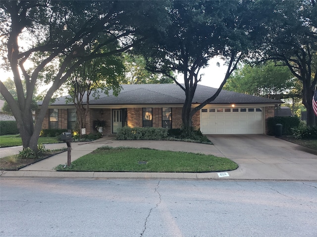 single story home with a garage