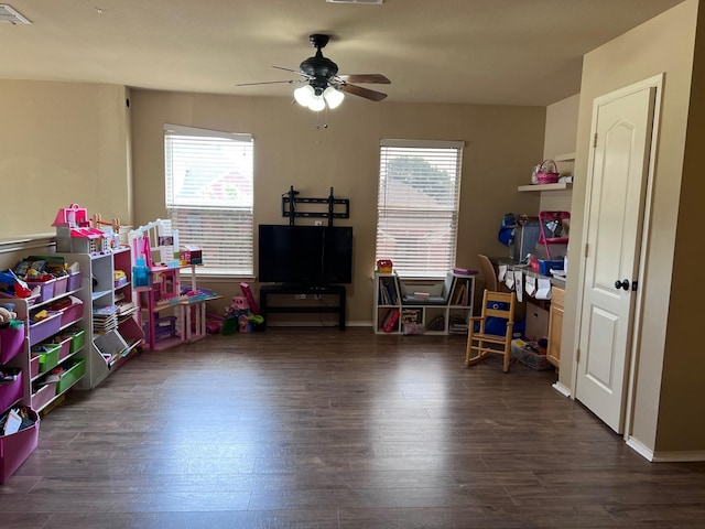 11536 Clover Knoll Dr, Frisco, TX 75035 - game room with healthy amount of natural light, wood finished floors, and a ceiling fan