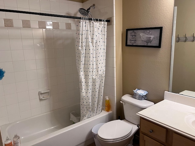 11536 Clover Knoll Dr, Frisco, TX 75035 - full bathroom with shower / bath combo, vanity, and a textured wall