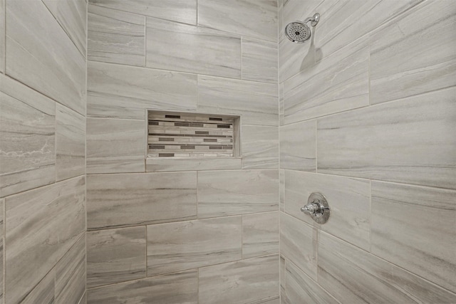 details with a tile shower