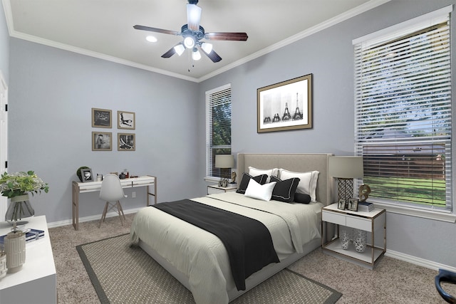 bedroom with ceiling fan, crown molding, and multiple windows