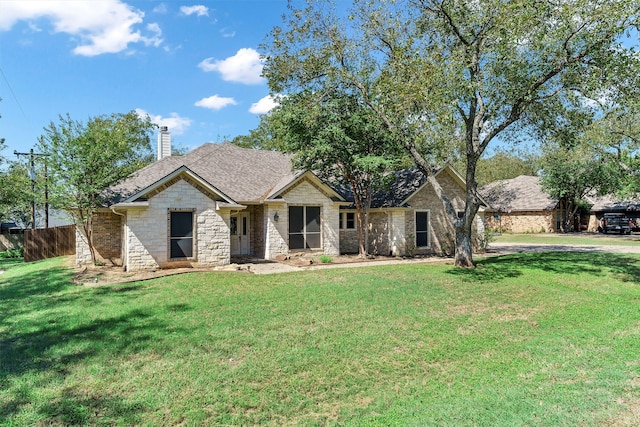 view of front of home featuring a front lawn