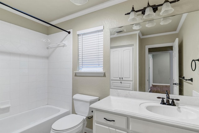 full bathroom with ornamental molding, vanity, tiled shower / bath combo, and toilet