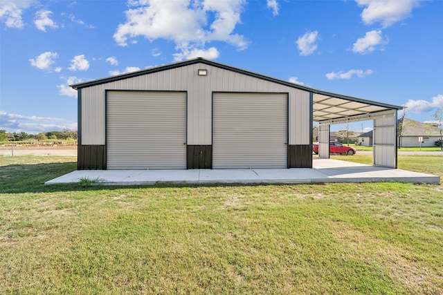 garage with a yard