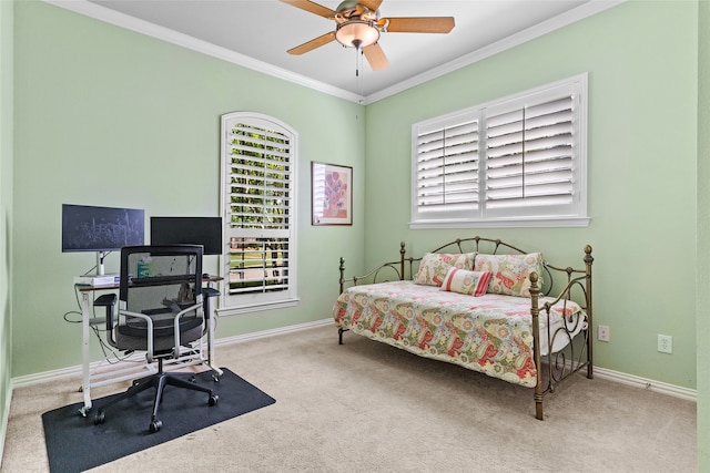 carpeted bedroom with ceiling fan and crown molding