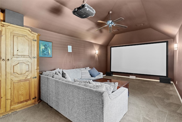 home theater with carpet, vaulted ceiling, and ceiling fan