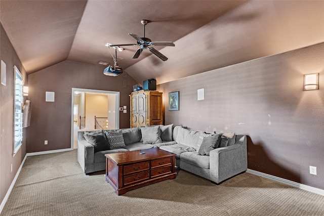 living room with vaulted ceiling, ceiling fan, and carpet flooring