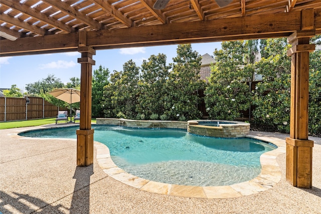 view of swimming pool with a patio and an in ground hot tub